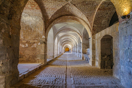 Figueres, Spain - 3 Aug, 2024: Horse stables within the Castillo de San Fernando (Sant Ferran Castle) military fortress, Figueres, Catalonia