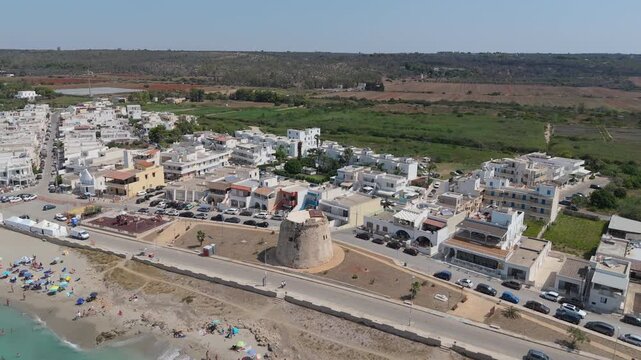 Torre Mozza is a coastal town in Salento, Puglia, known for its white sandy beaches and crystal-clear waters. The 17th-century tower, from which it takes its name, overlooks the scenic coastline