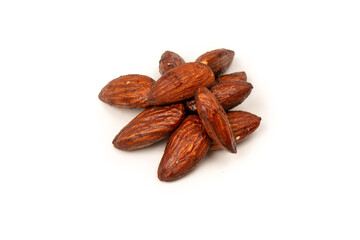 A group of caramelized almonds isolated on a white background.