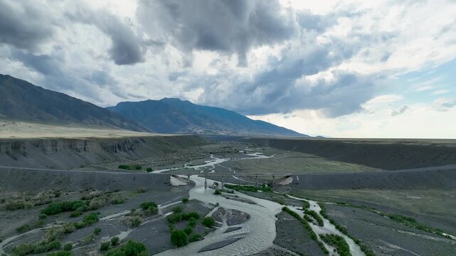 The main pass through the western ranges of Junggar Basin is the so-called Dzungarian Gate, which leads to Lake Alakol and Lake Balqash in Kazakhstan.