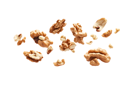 Realistic cutout of walnut pieces floating in mid-air on transparent background, ideal for food and health design