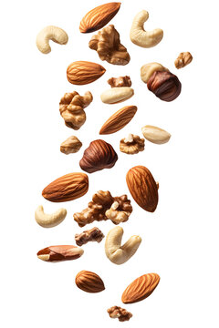 Realistic nuts including almonds, cashews, and walnuts falling down, isolated cutout on transparent background