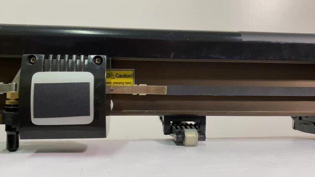 paper plotter. flatbed plotter. plotter detail. slow motion video. High quality 4K shooting.