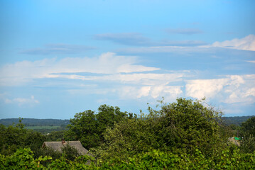 Ukrainian landscape in summer with hills, forests and blue sky , fascinating view photo