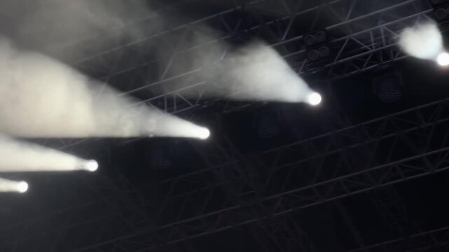Moving stage light head setup testing before outdoor stage lighting for concert