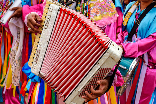 Accordionist playing his instrument during a religious festival in the streets of Belo Horizonte, Brazil