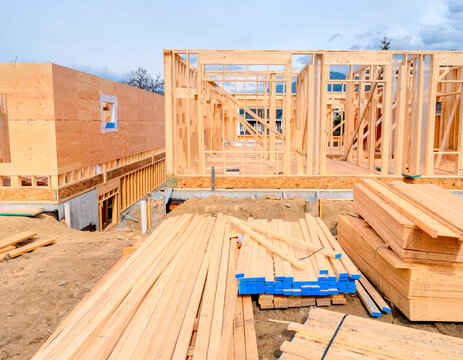 Wooden frame of new building with engineered lumber materials in front