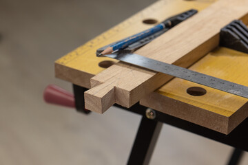 Senior man Cutting Dovetails With Woodworking Hand Tool for Hobby After retirement.