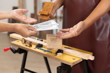 Senior man Cutting Dovetails With Woodworking Hand Tool for Hobby After retirement.
