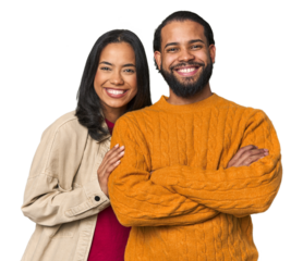 Young Latino couple in studio who feels confident, crossing arms with determination.