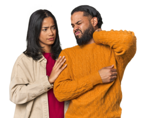 Young Latino couple in studio having a neck pain due to stress, massaging and touching it with hand.
