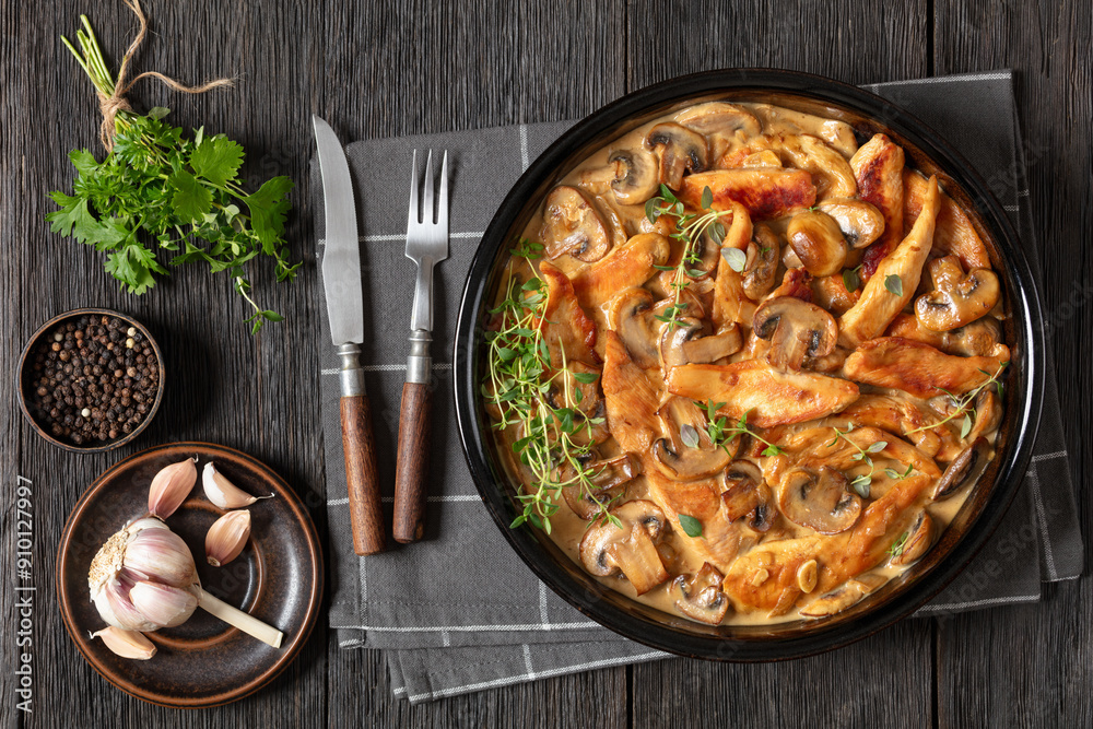 Wall mural chicken stroganoff in a baking dish, top view