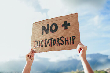 Venezuela opposition, People protest against presidential election results, holding banner signs on city streets. Democracy and activism © Vane Nunes