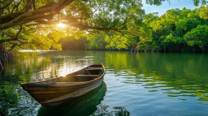 canoe on a lake surrounded by forest on a sunrise