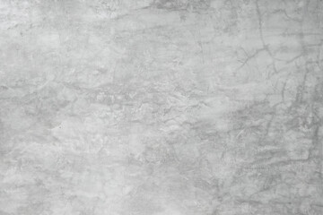 Texture of gray decorative plaster or concrete with crack. Abstract background for design. Cement wall texture. Loft style.