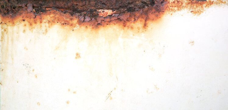 Rust of metals plate texture with weathered. Corrosive grunge rusted on iron. The pattern of grunged rust on the wall on white background use as illustration.Rusty corrosion and oxidized.Panorama.