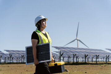 female technician working in solar power station