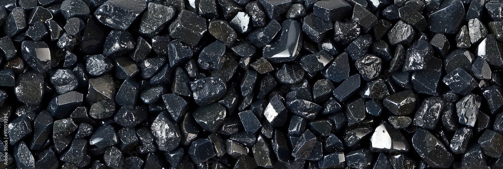 Poster crushed black stone aggregate showcases its versatile texture, ideal for landscaping and constructio