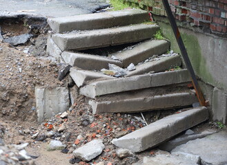 Broken concrete steps of the old staircase