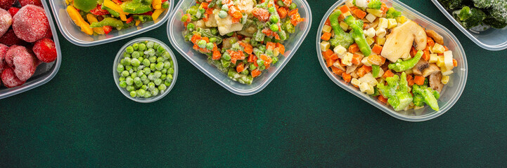 Food in winter, freezing fresh vegetables in summer in the refrigerator, various frozen vegetables in plastic dishes in the middle of the background, banner, background of containers with vegetables