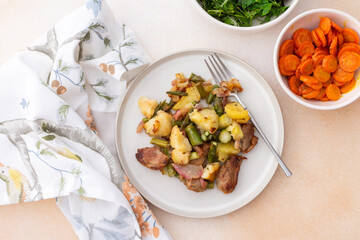 Stewed duck fillet with potatoes and asparagus and radishes, mixed salad of various greens, baked carrots in tahini sauce, healthy delicious breakfasts or lunches