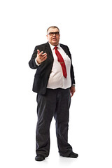 Debates. Full-length of overweight man, businessman in black suit and glasses standing and confidently talking isolated on white background. Concept of business, promotion, achievement