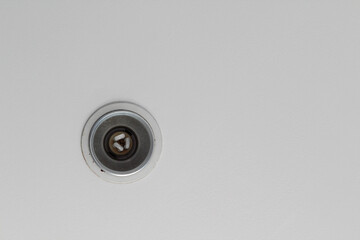 Ceiling downlight on the white ceiling