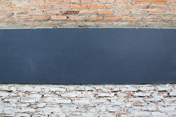 White brick and grey concrete wall