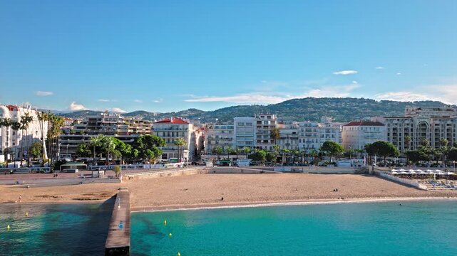 Aerial view of Cannes famous resort town on the coastal French Riviera. Luxury travel destination in France, town with sandy beaches Croisette Beach Cannes and palatial hotels.