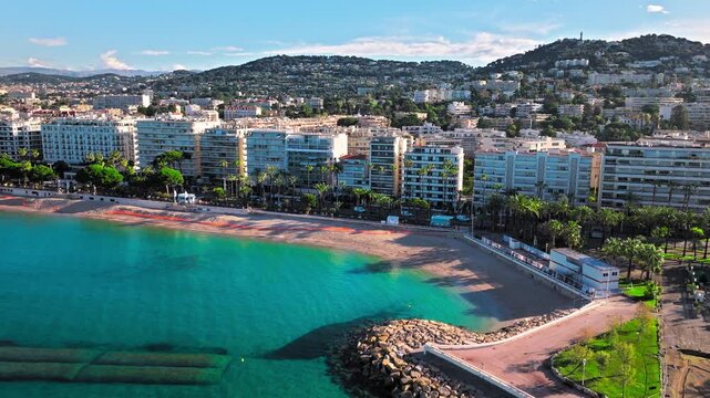 Aerial view of Cannes famous resort town on the coastal French Riviera. Luxury travel destination in France, town with sandy beaches Croisette Beach Cannes and palatial hotels.