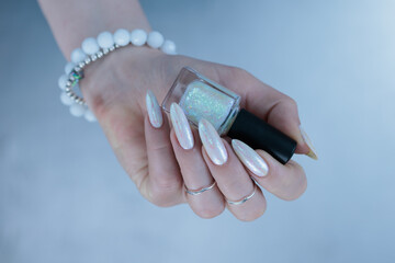 beautiful female hands with long nails light white manicure