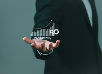 Businessman with productivity icons for efficient and effective industrial management. Lean cost and productivity growth. Productivity improvement process concept.