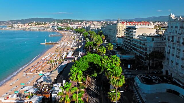 Aerial view of Cannes famous resort town on the coastal French Riviera. Luxury travel destination in France, town with sandy beaches Croisette Beach Cannes and palatial hotels.