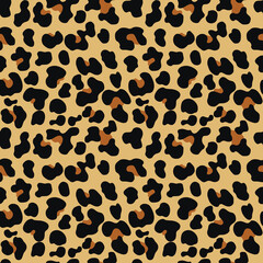 
yellow leopard print seamless vector pattern for design