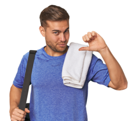 Athlete with gym bag, studio feels proud and self confident, example to follow.