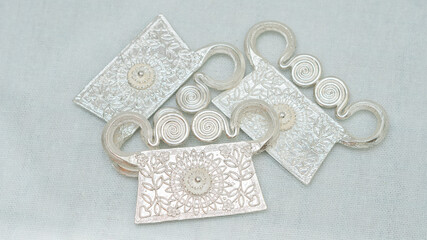 Beautiful handmade silver jewelry on white background