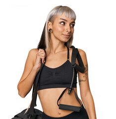 Young Caucasian with exercise bands