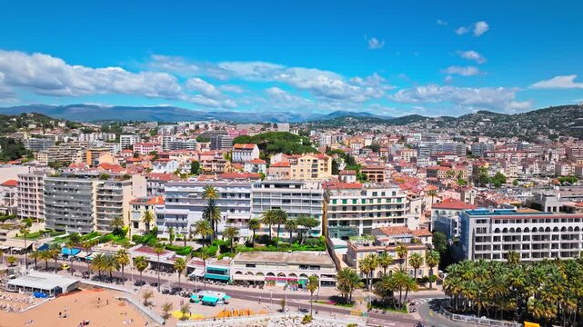 Aerial view of Cannes famous resort town on the coastal French Riviera. Luxury travel destination in France, town with sandy beaches and palatial hotels in Cannes, France.