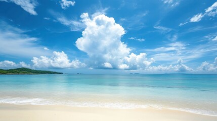 Fototapeta premium Idyllic Beachscape: Azure Sky, Pristine Shoreline, and Tranquil Waters