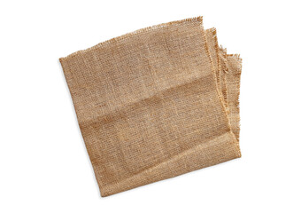 Old folded burlap fabric napkin, sackcloth piece isolated on white background with clipping path...