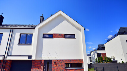 Terraced single family homes in newly developed housing estate. The real estate market in the...