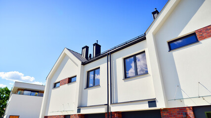 Terraced single family homes in newly developed housing estate. The real estate market in the...