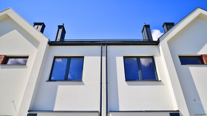 Terraced single family homes in newly developed housing estate. The real estate market in the...