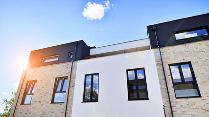 Terraced single family homes in newly developed housing estate. The real estate market in the...