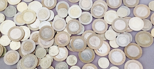 Stacks of Turkish money, broken metal Turkish Lira on a white background.