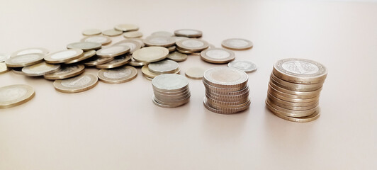 Stacks of Turkish money, broken metal Turkish Lira on a white background.