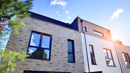 Terraced single family homes in newly developed housing estate. The real estate market in the...