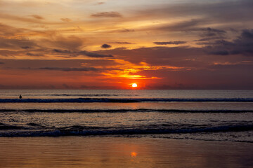 Fototapeta premium Beautiful colorful sunset over the Indian Ocean in Bali, Indonesia. Desktop wallpaper. Nature. Travel concept.