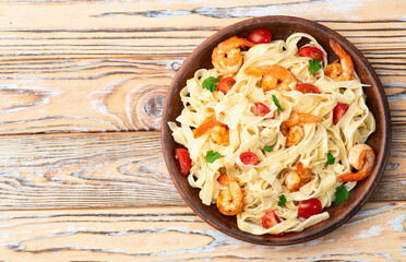 Italian pasta with shrimps , parmesan and tomatoes