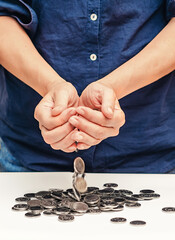 Business woman hands holding finance currency coins